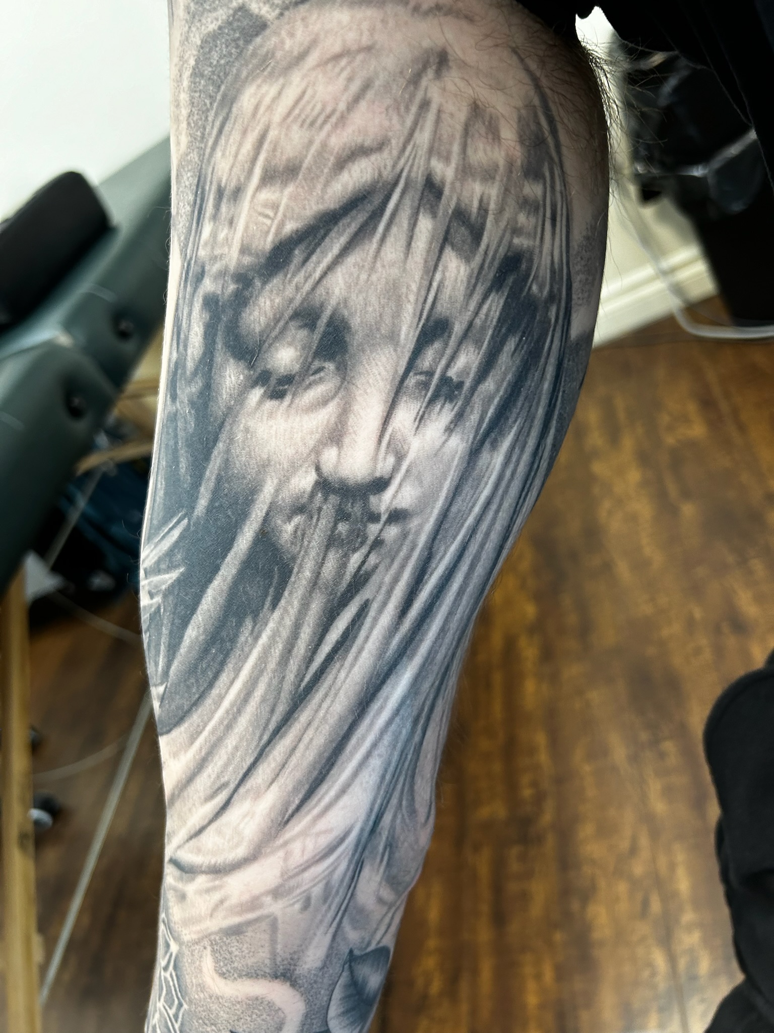Angel statue tattoo