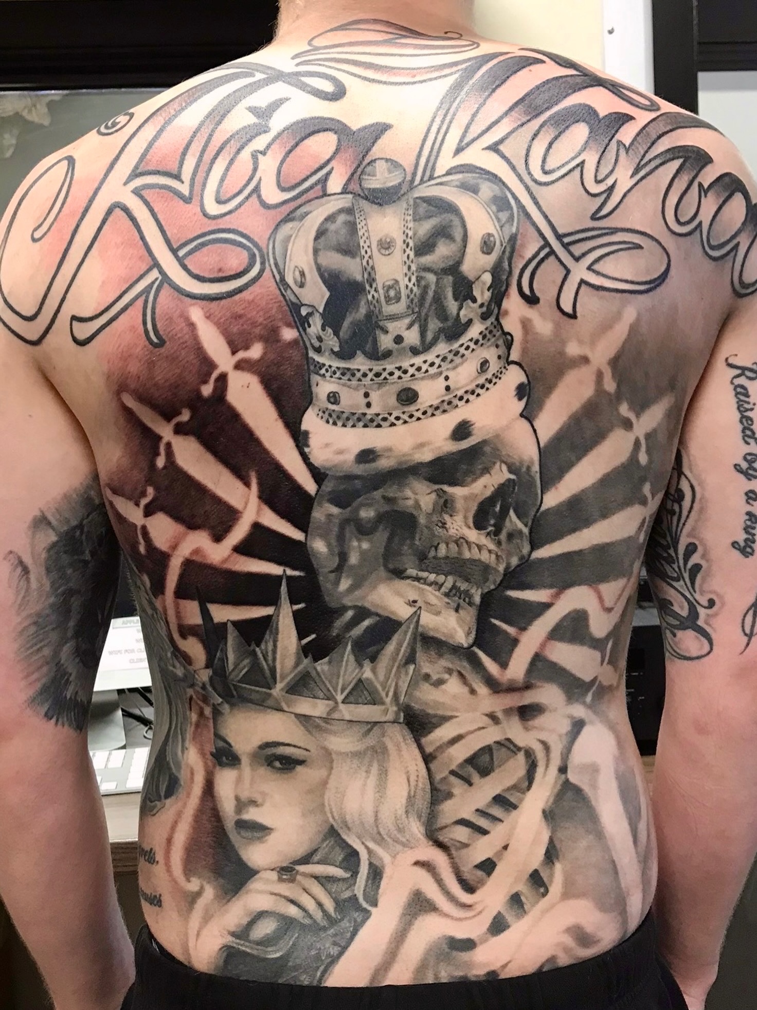 Black and grey sleeve tattoo