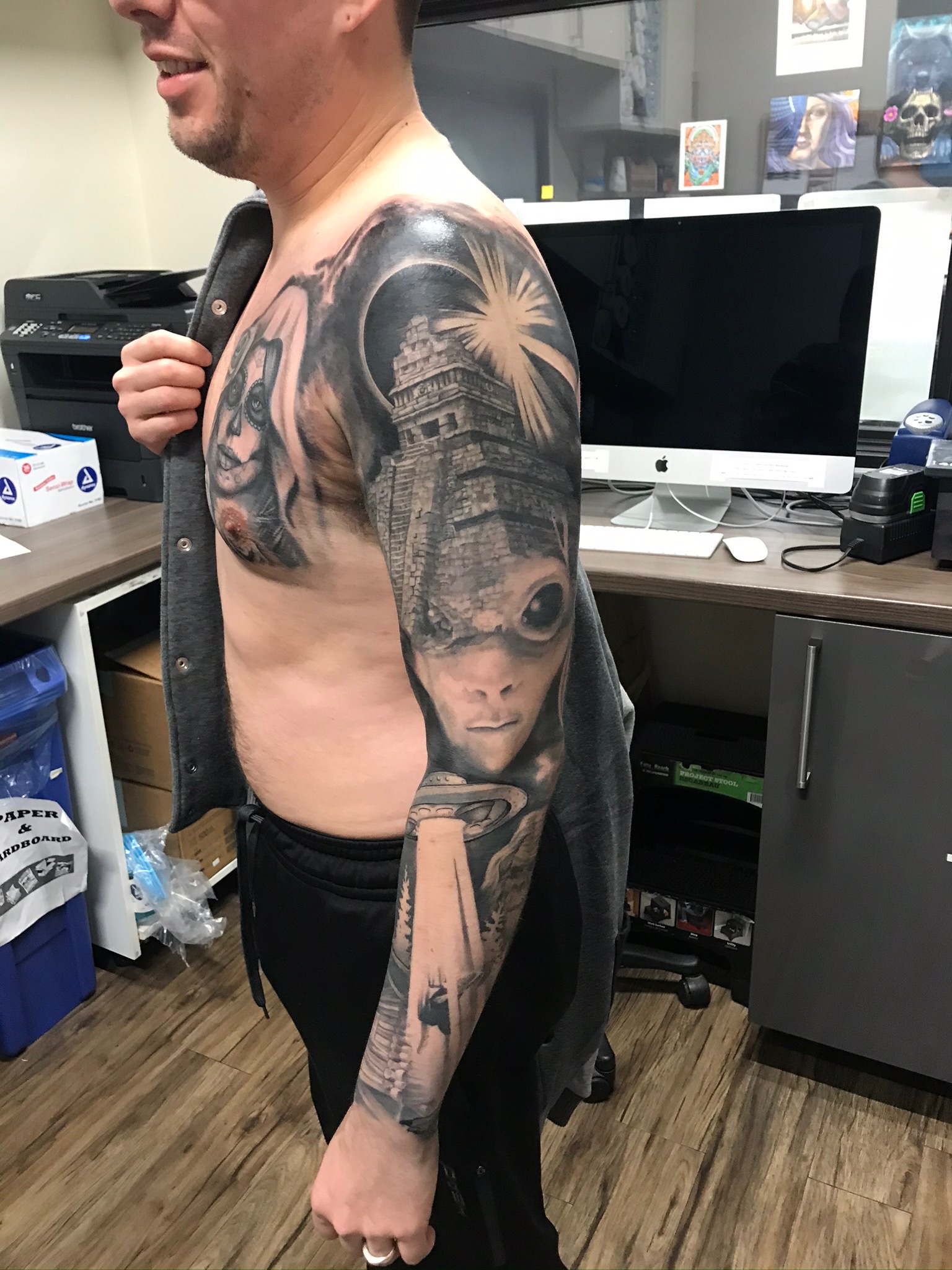 Black and grey sleeve tattoo
