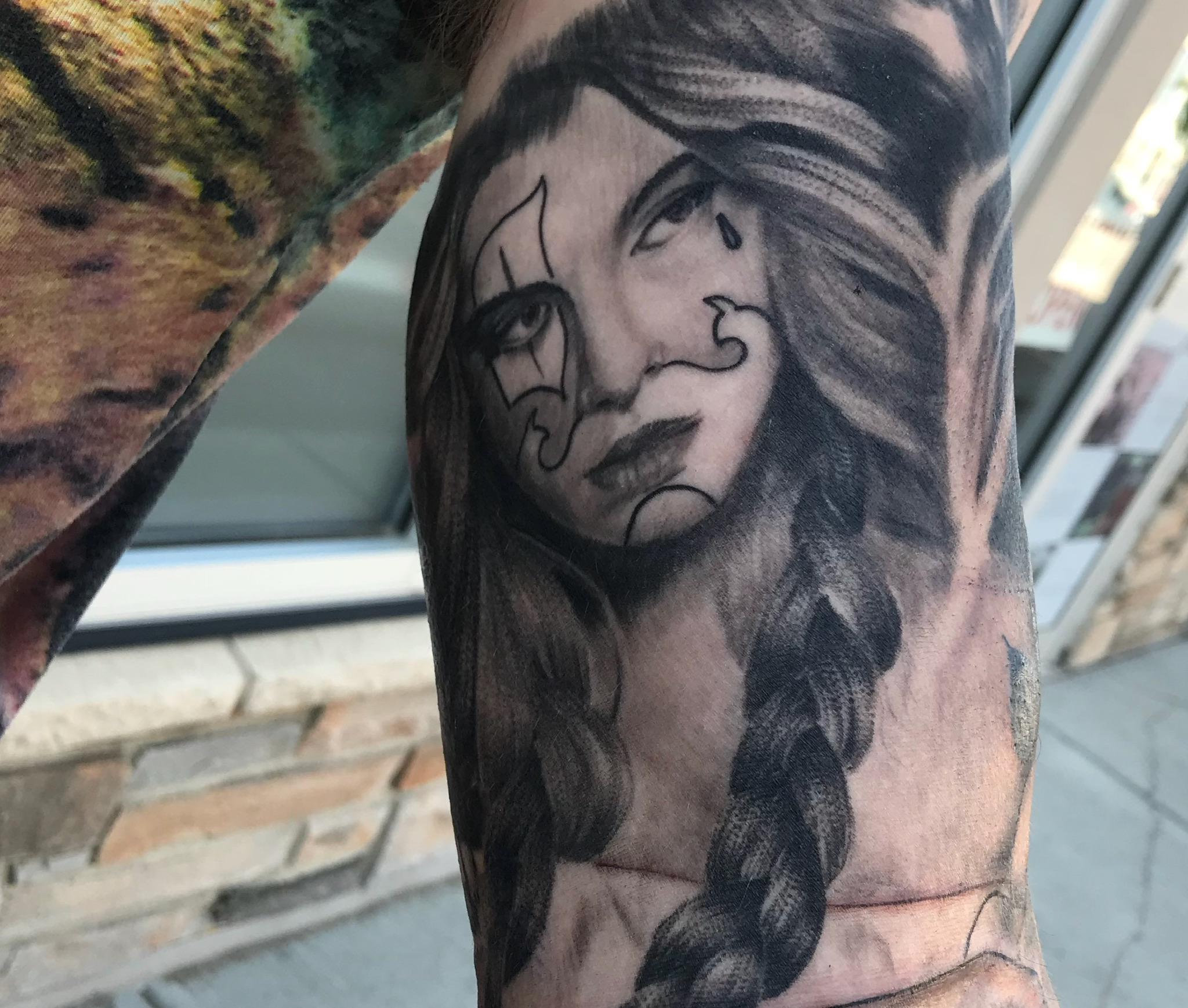 Black and grey sleeve tattoo