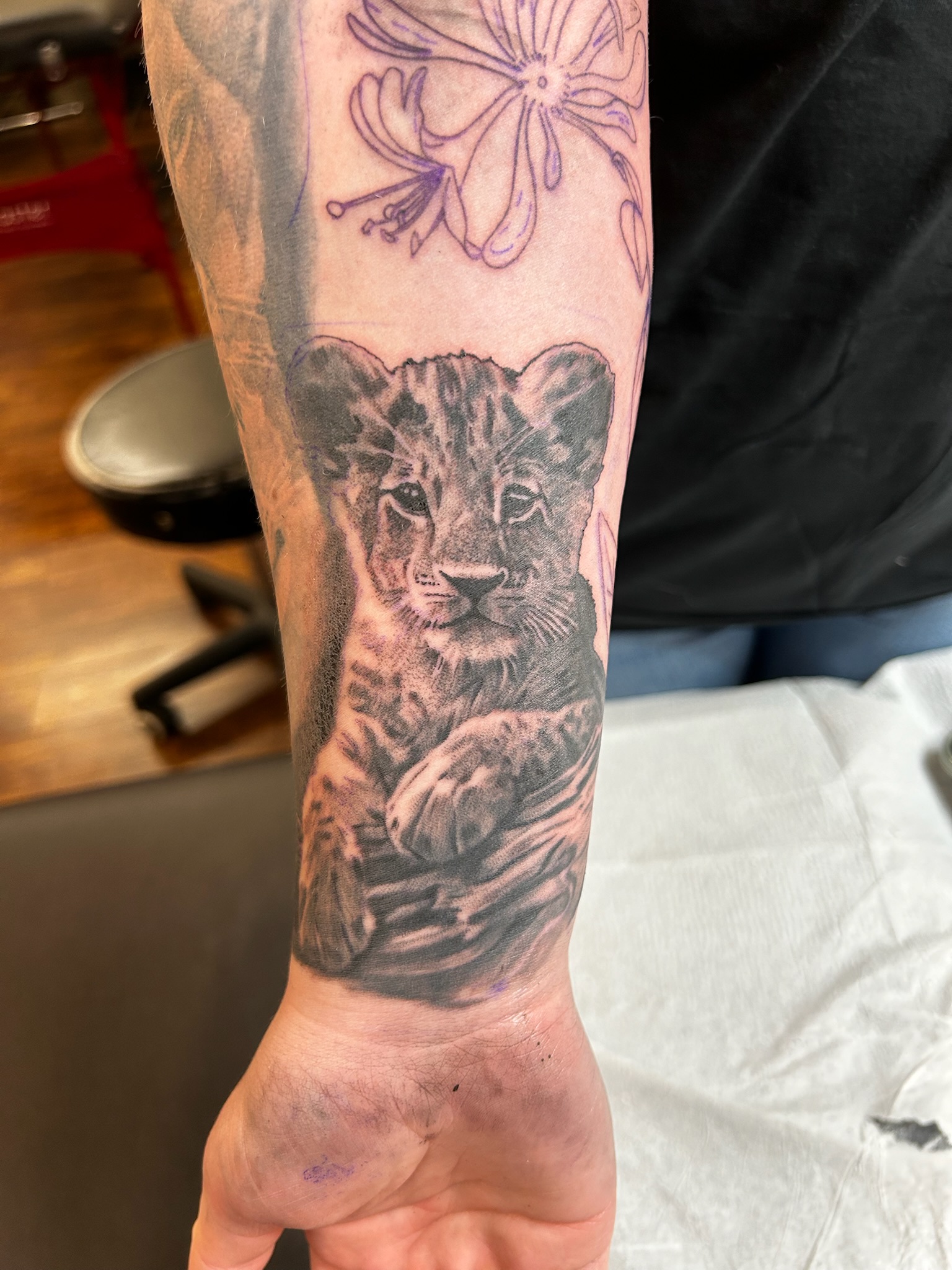 Baby lion tattoo