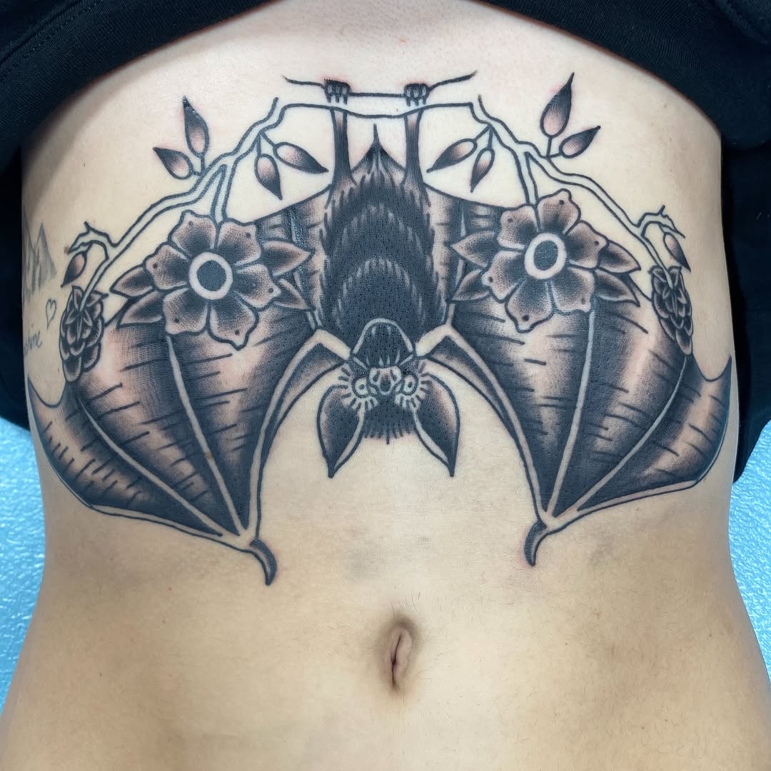 Black and grey bat tattoo by Marshall